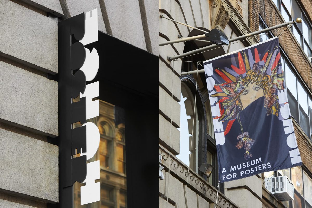 photograph of the banner flag above the 23rd Street entrance to Poster House