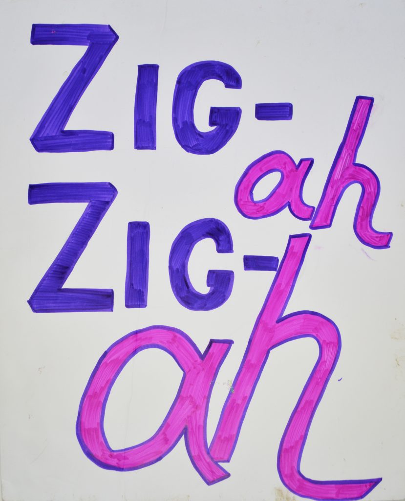 A poster of a purple and magenta hand drawn text of 