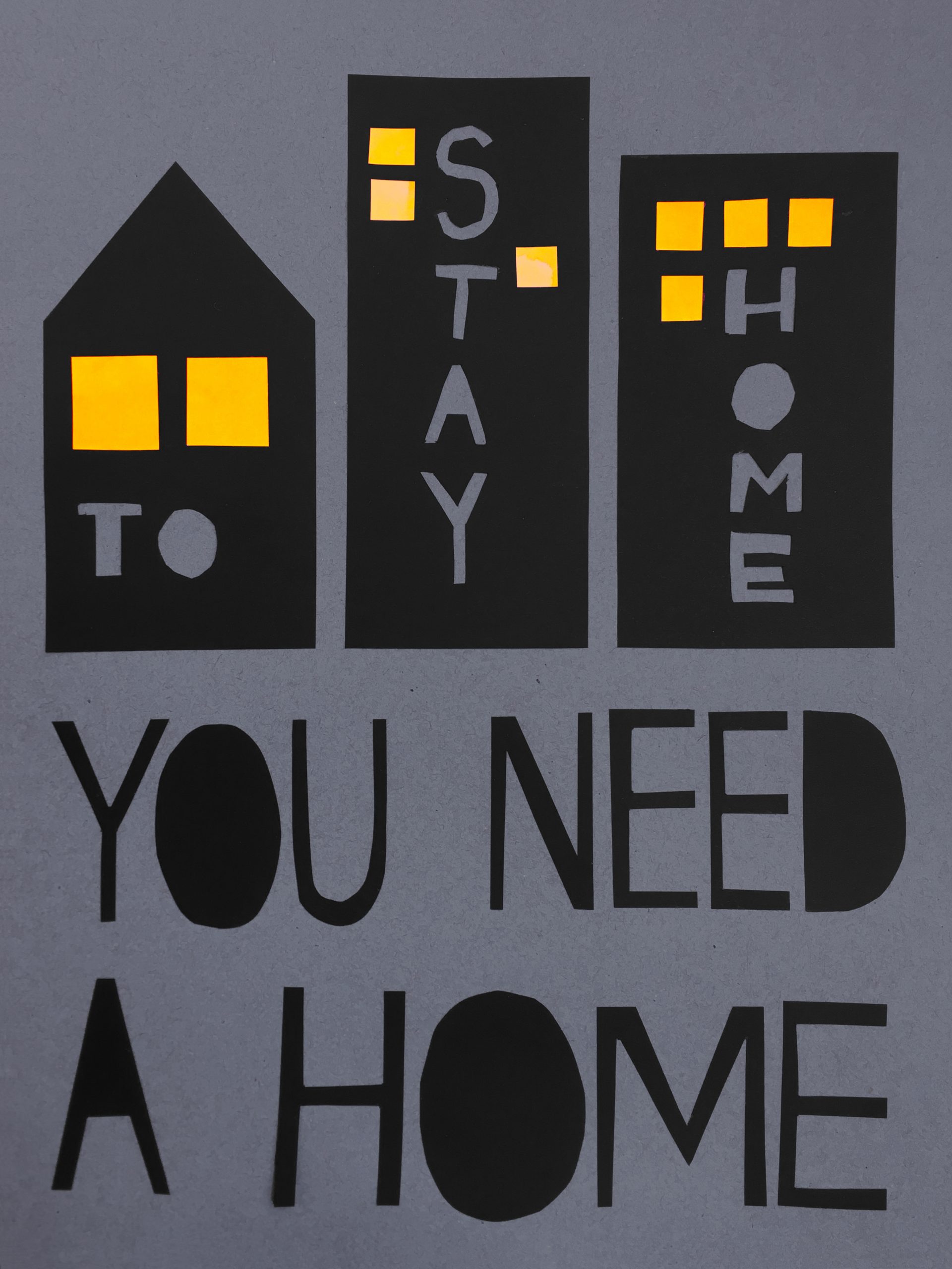 A poster featuring 3 buildings with the text, to stay home you need a home.