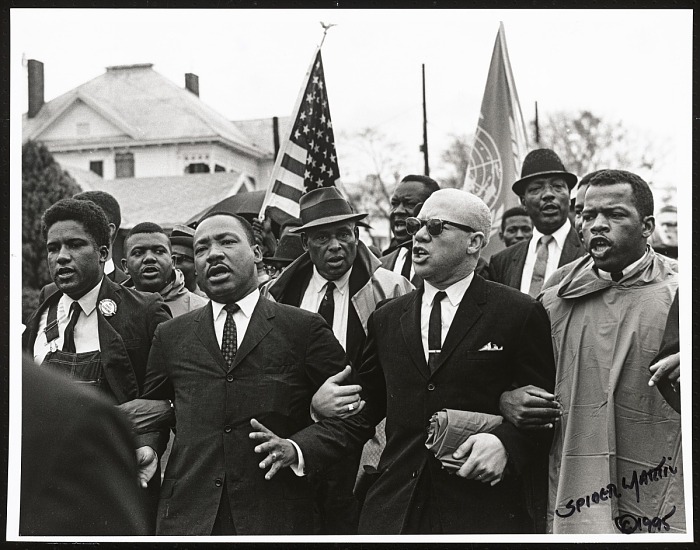 A photograph of Martin Luther King Jr. arm-in-arm with fellow Selma to Montgomery marchers. Photo credit: Spider Martin/Collection of the Smithsonian National Museum of African American History and Culture © 1965