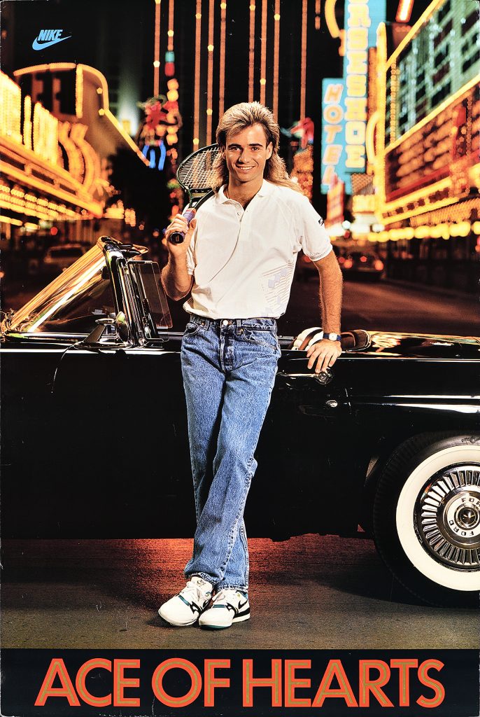 Poster of a man leaning against a black convertible in Times Square.