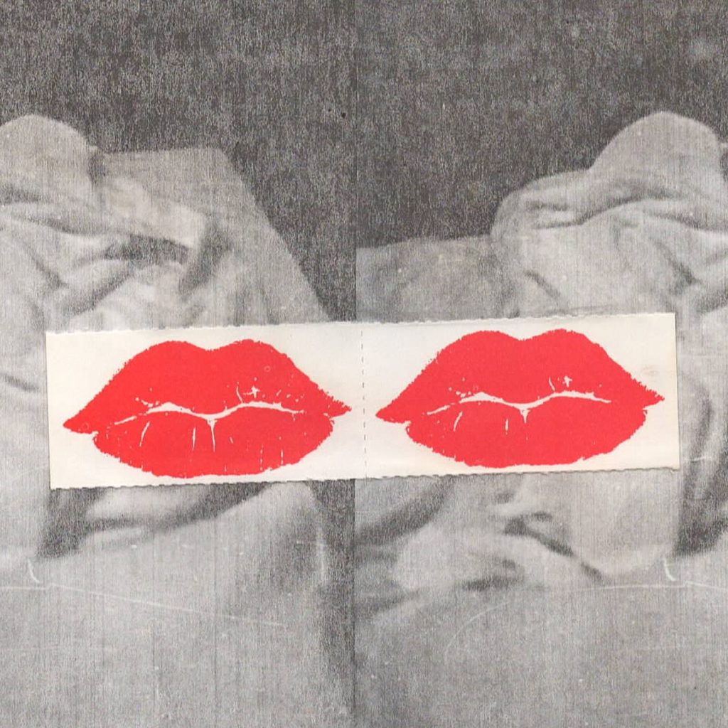 A photo image of two red lips atop a black and white photo image