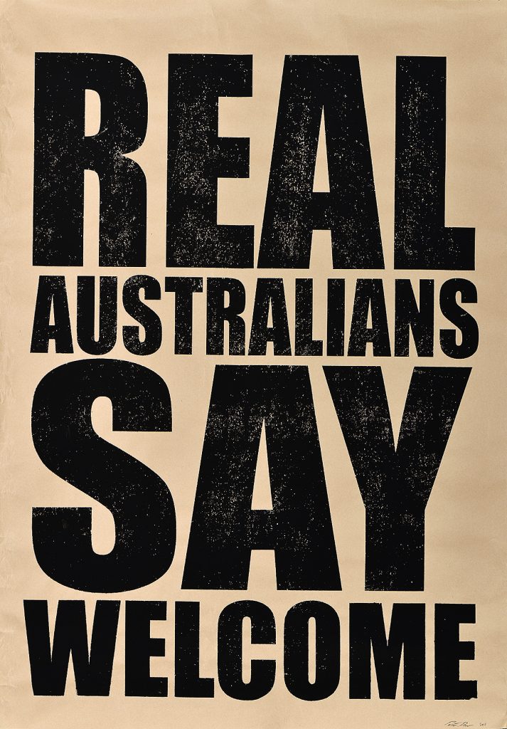 Black text on a tan background reading real australians say welcome.