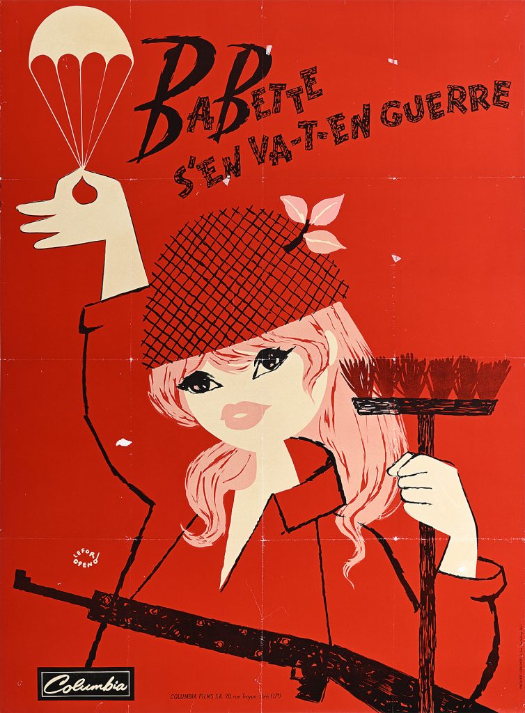 woman in red holding up a parachute and a broom.