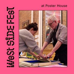 Two people leaning over a table making a screenprint.