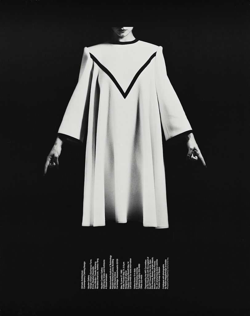 Poster of a white garment on a ghostly body.