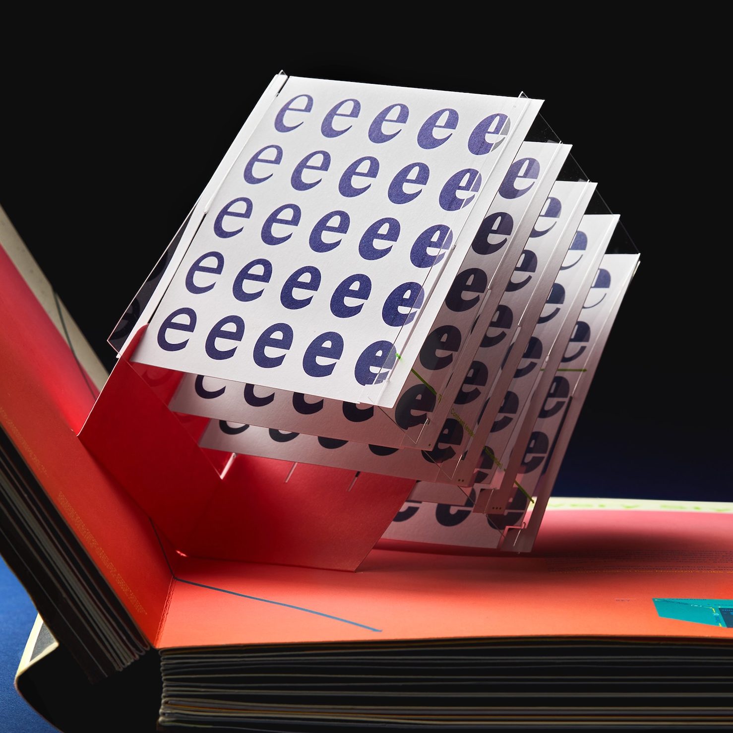 A partially open pop-up book.